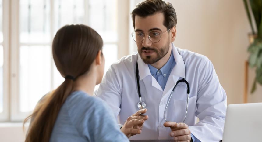 Doctor speaking with his patient