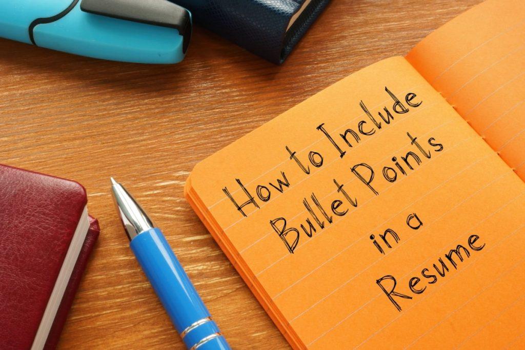 picture of pen and notebook that reads "how to include bullet points in a resume"