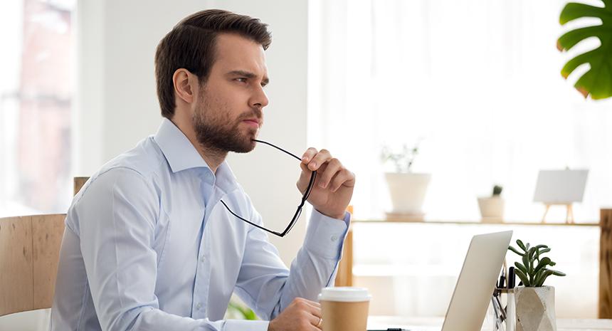 Pensive business man at desk