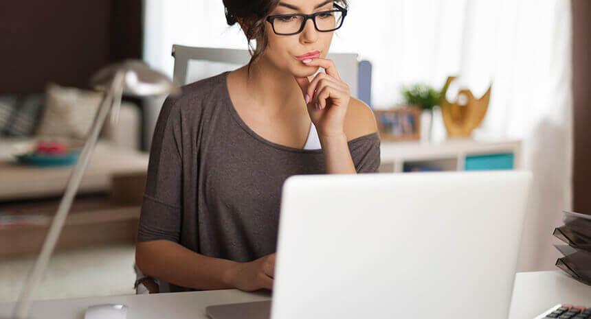 Woman looking into her laptop