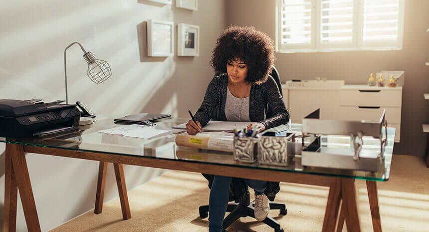 Woman writing a cover letter