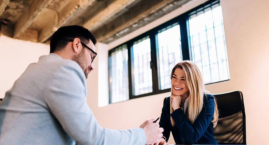 Woman happy while being interviewed for a job position