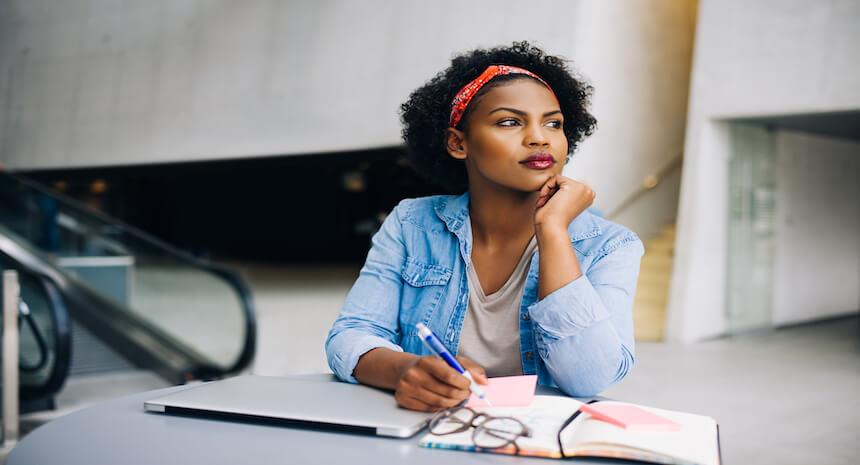 Woman calculating her strengths during a career change