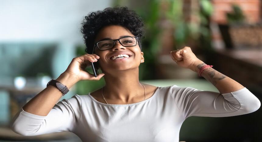 Young woman exited while on the phone