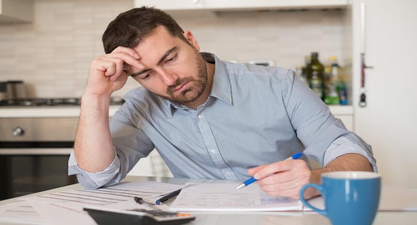 Man feeling exhausted and unmotivated at work