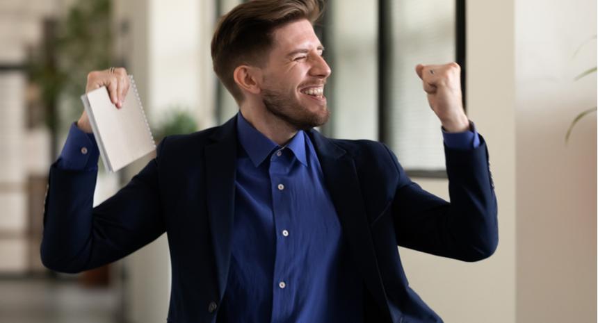 Man is very happy to hear back from a job he interviewed for